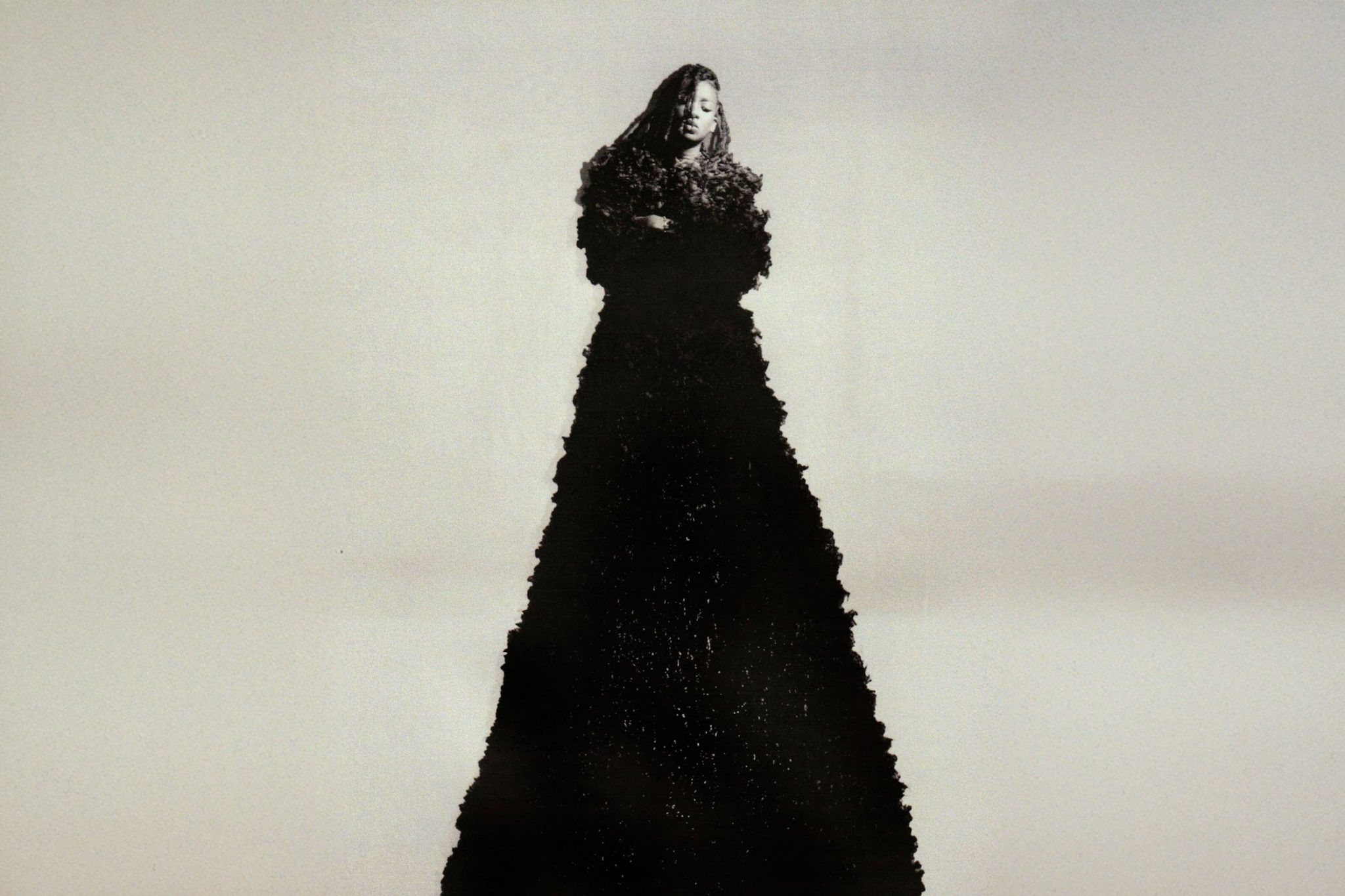 Little Simz has teased a new song 'Flood' with a stormy black-and-white ...