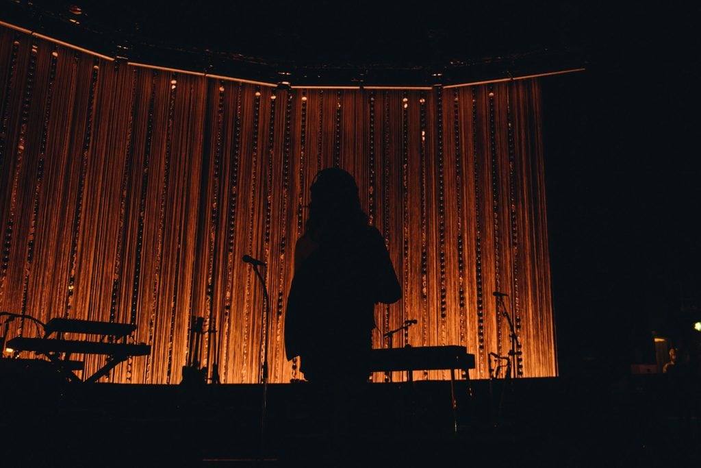 Clairo's night at London’s Eventim Apollo is a masterclass in how to make a sit-down show not boring