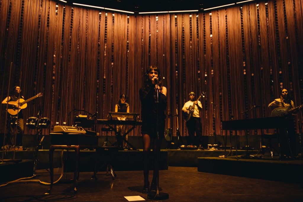 Clairo's night at London’s Eventim Apollo is a masterclass in how to make a sit-down show not boring