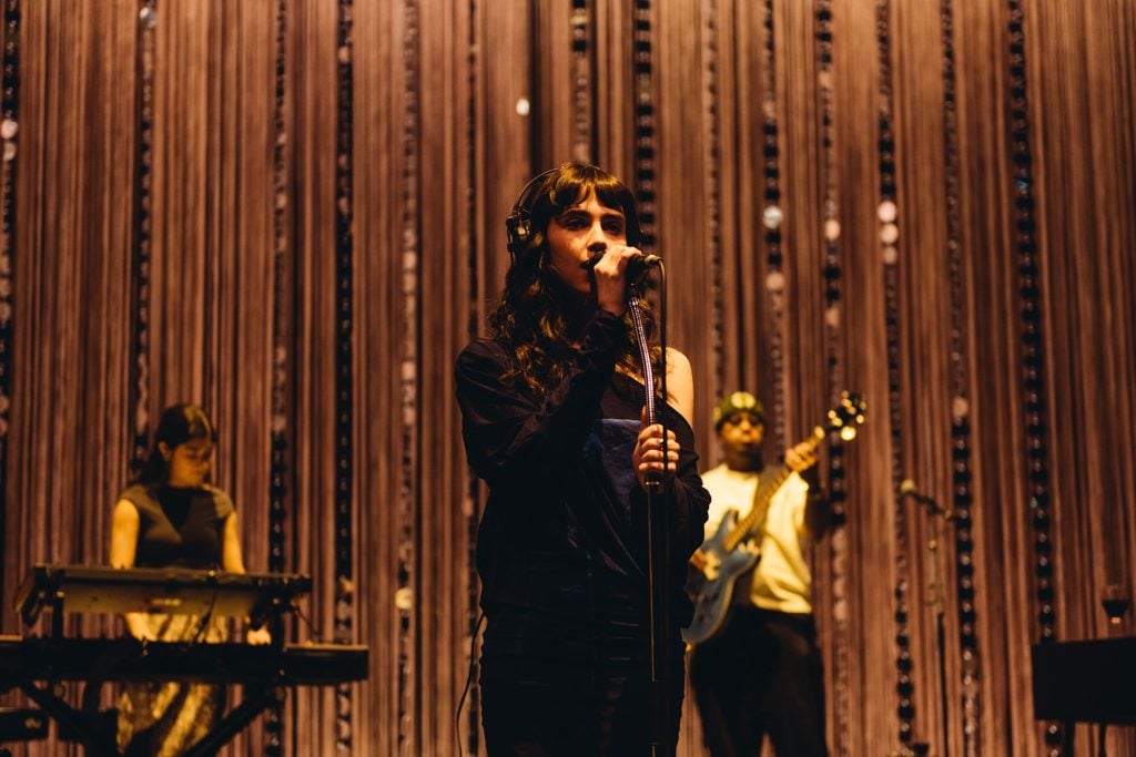 Clairo's night at London’s Eventim Apollo is a masterclass in how to make a sit-down show not boring