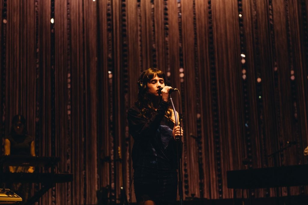 Clairo's night at London’s Eventim Apollo is a masterclass in how to make a sit-down show not boring