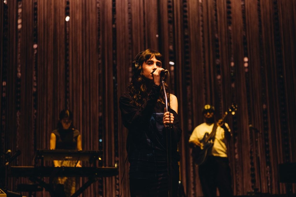 Clairo's night at London’s Eventim Apollo is a masterclass in how to make a sit-down show not boring