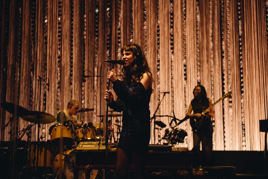 Clairo's night at London’s Eventim Apollo is a masterclass in how to make a sit-down show not boring
