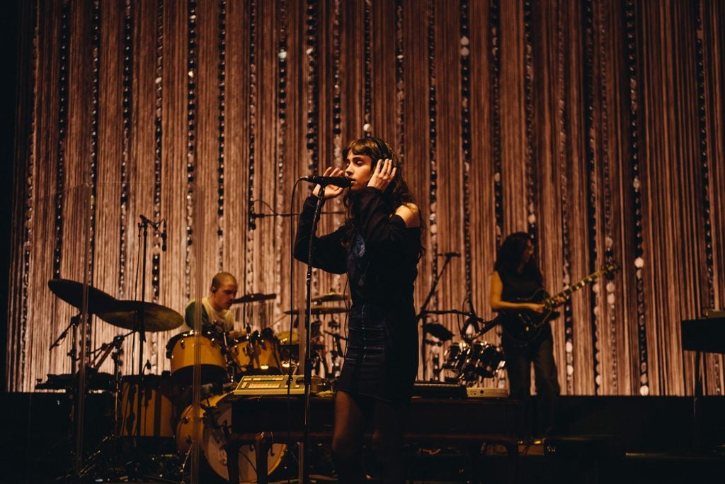 Clairo's night at London’s Eventim Apollo is a masterclass in how to make a sit-down show not boring
