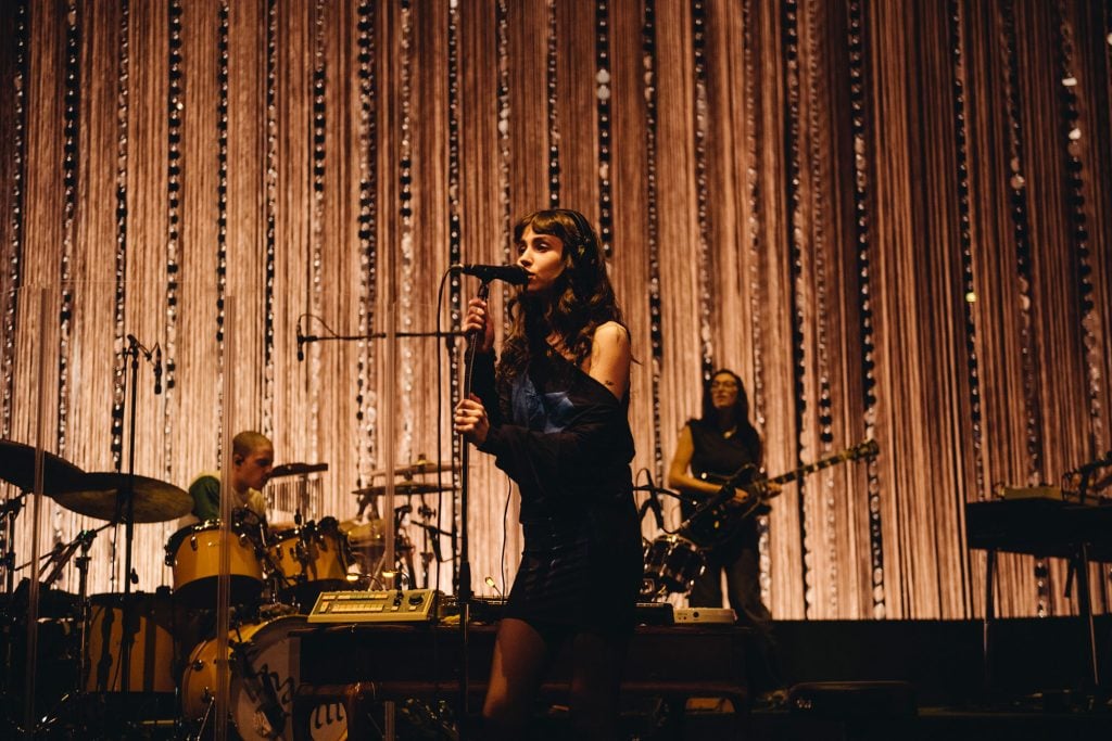 Clairo's night at London’s Eventim Apollo is a masterclass in how to make a sit-down show not boring