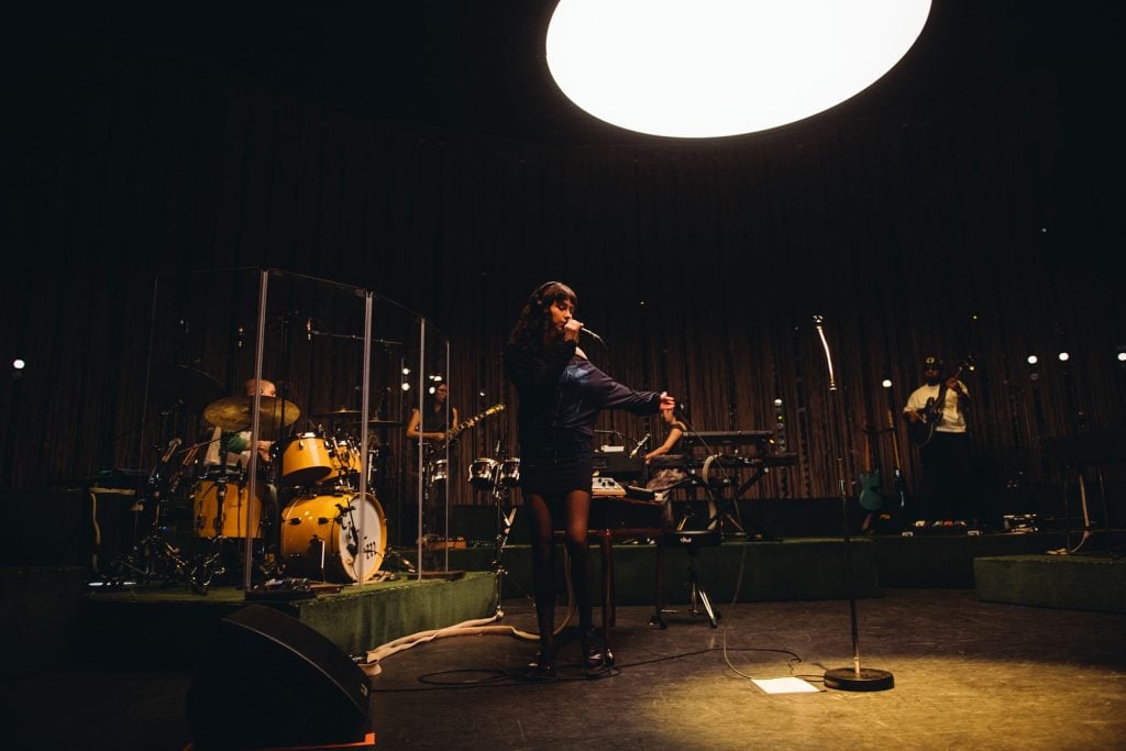 Clairo's night at London’s Eventim Apollo is a masterclass in how to make a sit-down show not boring