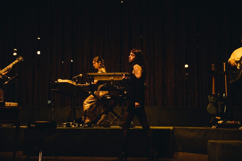 Clairo's night at London’s Eventim Apollo is a masterclass in how to make a sit-down show not boring